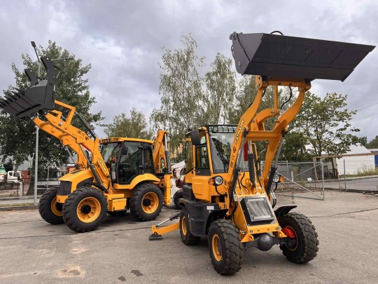 Экскаватор-погрузчик CAT-404