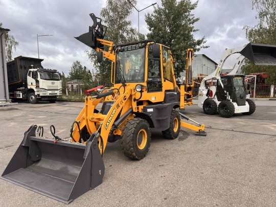 Экскаватор-погрузчик CAT-404