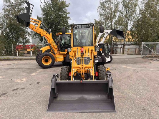 Экскаватор-погрузчик CAT-404