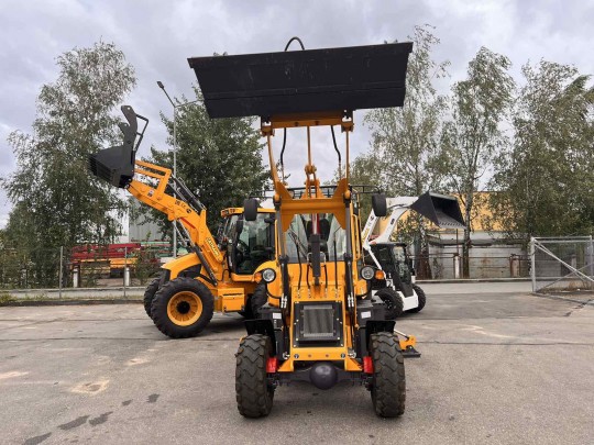 Экскаватор-погрузчик CAT-404