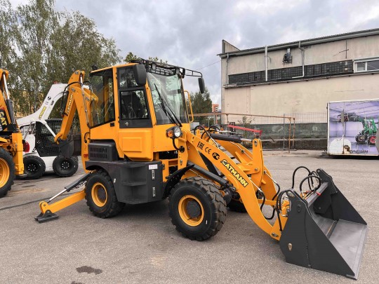 Экскаватор-погрузчик CAT-404